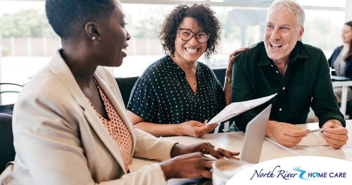 A couple talks with and advisor, representing the type of preparation that is crucial for successful senior care planning.