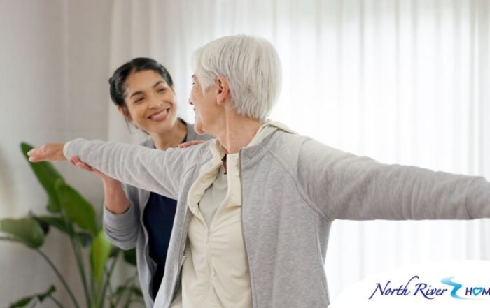 A caregiver and senior practice tai chi as one of many enriching activities for seniors at home.