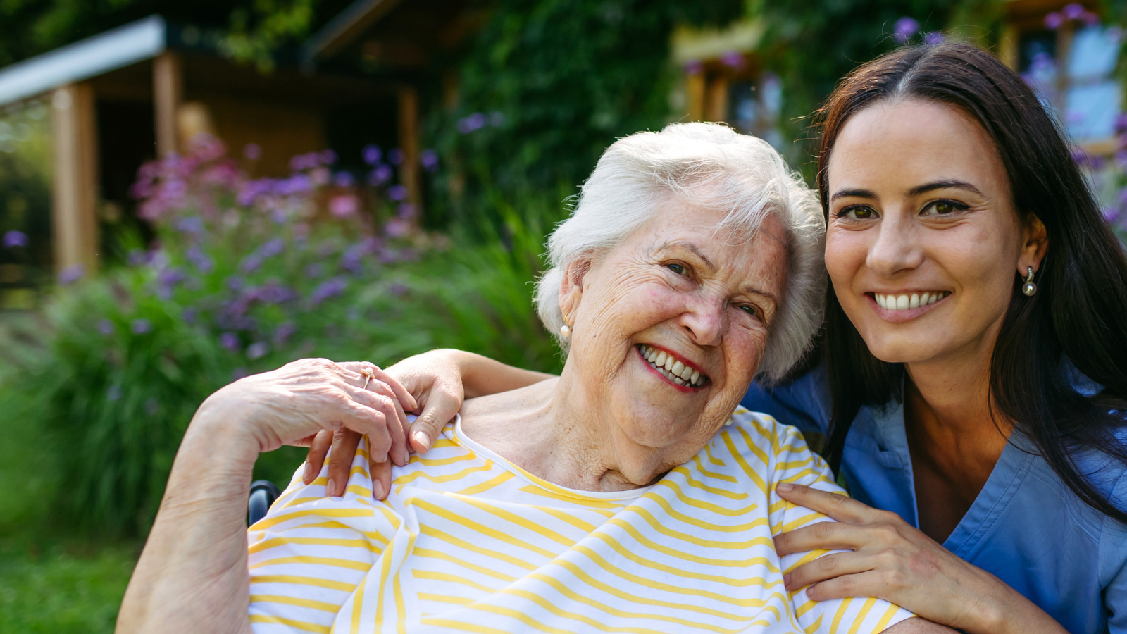 Website Header Slider Options (4) professional caregiver smiling with senior client