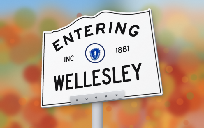 sign that says entering Wellesley